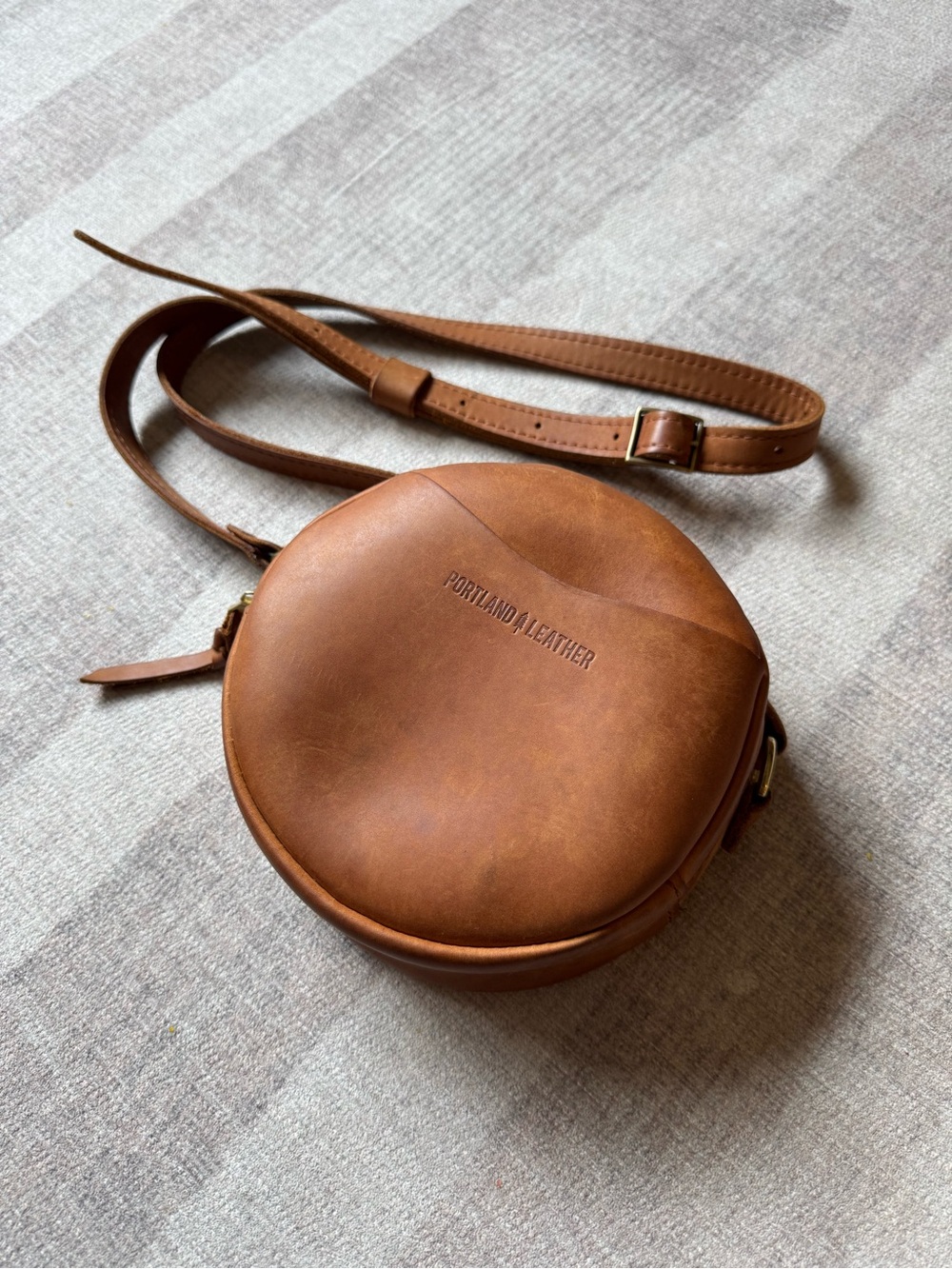 Portland Leather Round Crossbody Bag in Cognac Brown